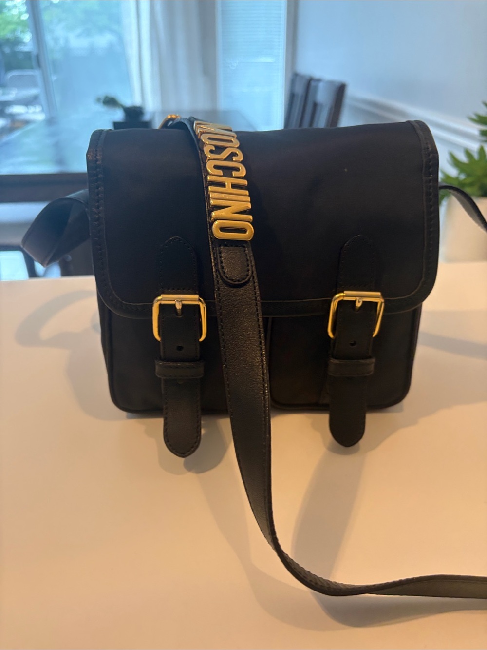 Moschino Black crossbody Bag with Gold Logo on strap